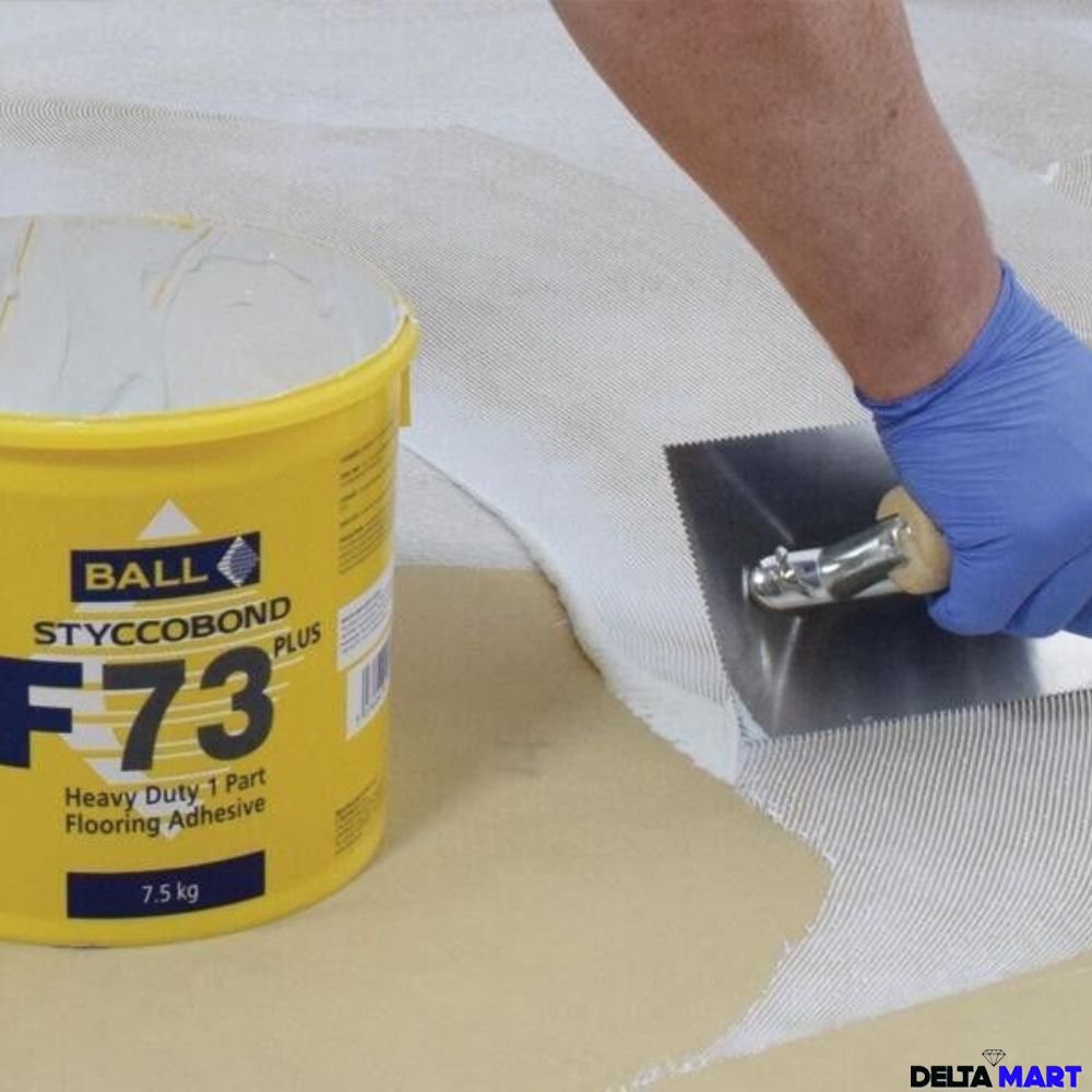 Opened STYCCOBOND F73PLUS adhesive showing fiber-reinforced texture