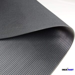 Rolled black ribbed mat partially unrolled, showing textured top surface and grooved underside; DeltaMart logo in corner.